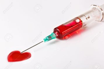 20728899-Isolated-hypodermic-syringe-with-heart-shape-blood-sample-over--Stock-Photo